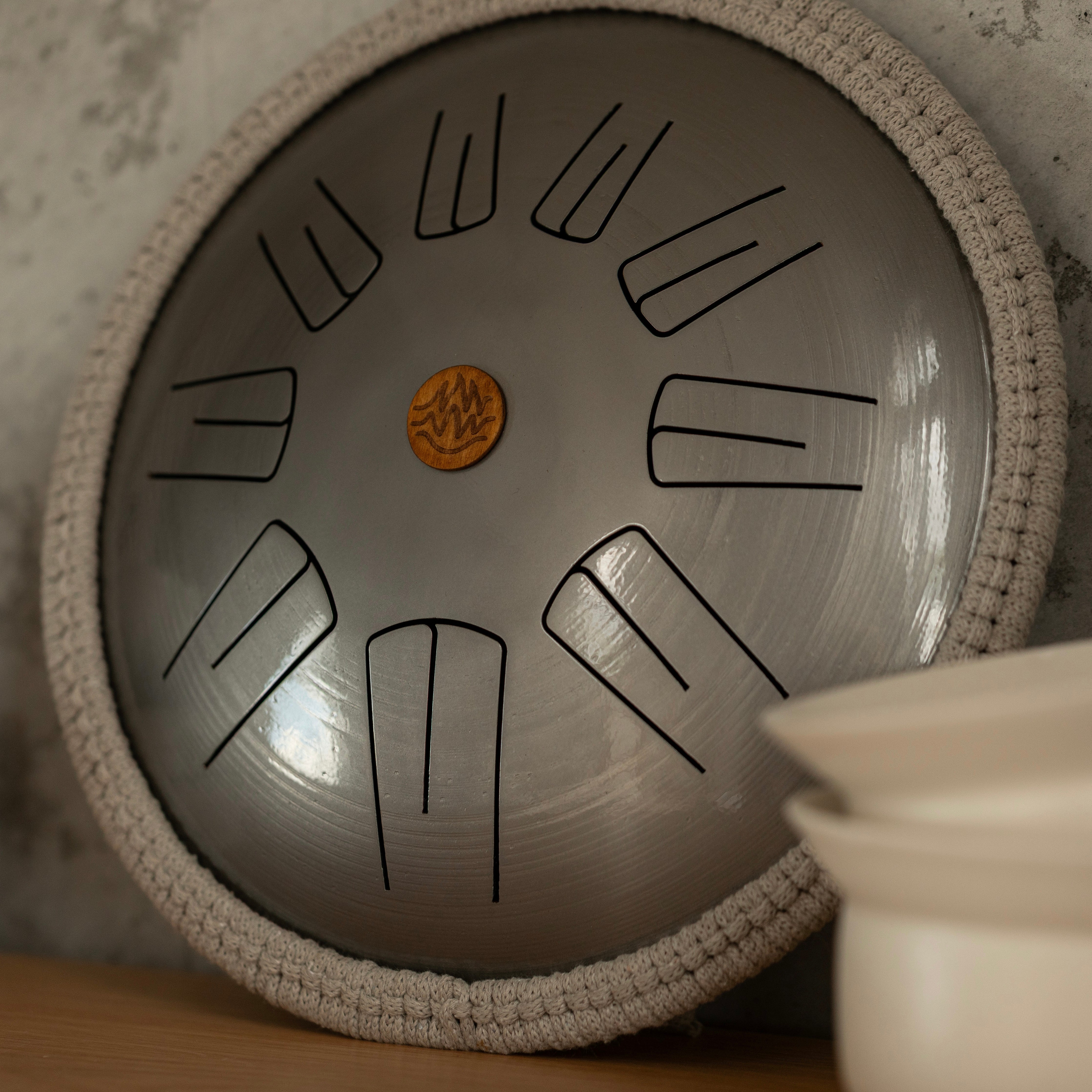 Close-up view of steel tongue drum Spark model notes and logo engraving