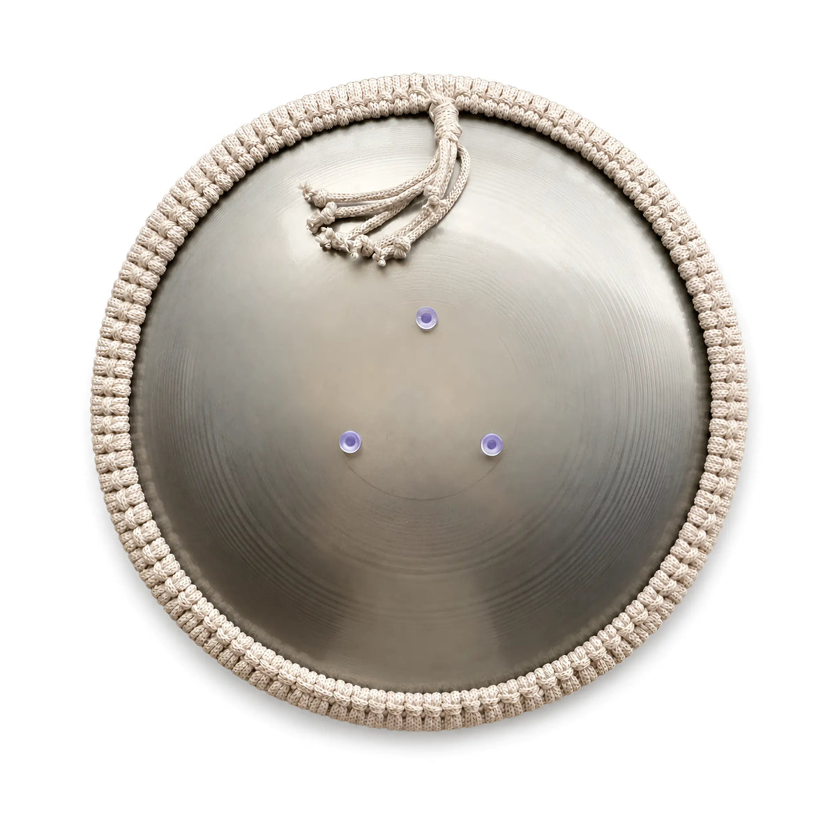 Rear view of a steel tongue drum Spark V2 model with a knotted grey rope macrame rim, shown on a white background.
