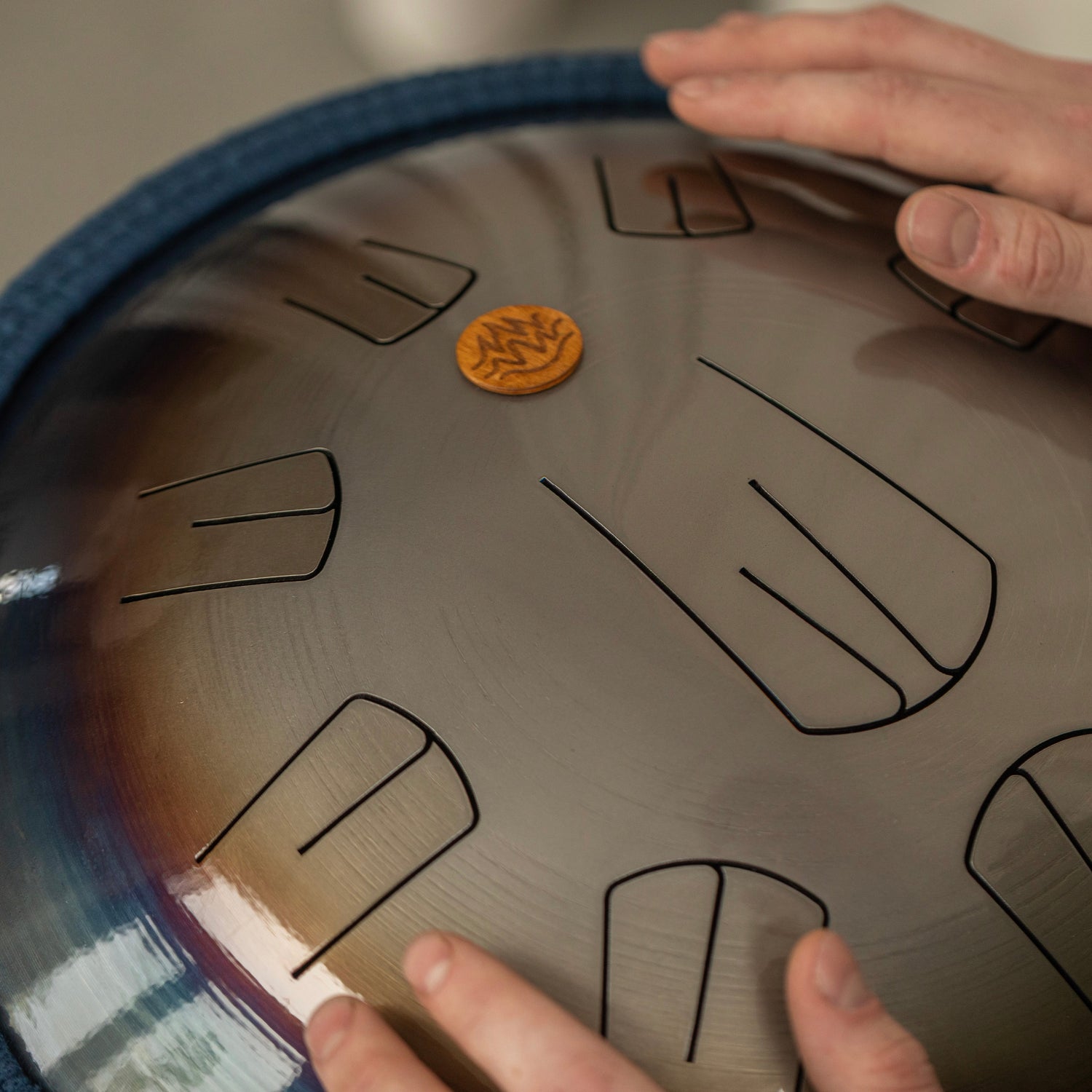 Steel tongue drum in natural design created with fire and heat-treated process by Burning27